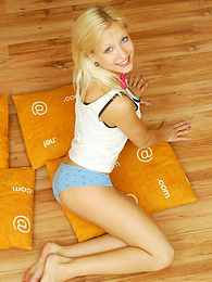 Very-Sexy.com presents: Amazing blonde nude teen decided to place herself at the attic of her wooden house on four orange pillows for her dirty intention.